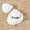 Retour de plage propose des bijoux fantaisie fabriqués avec des matériaux de qualité : céramique, lin, perles de verre, hématite, quartz, amazonite, perles de rivière, perle de jade, lapis lazuli, perles de culture, pierre de sable, etc.
