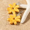 Boucles d'oreilles faites main en céramique jaune en forme de fleurs