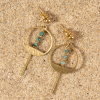 Boucles d'oreilles dorées pendentifs rond et perles unakite kaki