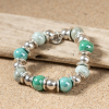 Bracelet argenté perles céramiques vertes et bleues