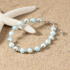 Bracelet artisanal argenté perles en larimar bleu