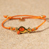Bracelet fantaisie cordon orange poisson doré