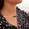 Le collier Faucon : un collier artisanal made in France en câble en acier de couleur argenté, de 3 perles en agate noir et de perles en strass argenté en métal plaqué argent 999.