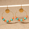 Boucles d'oreilels créoles dorées perles turquoises et orange