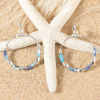 Boucles d'oreilles Trikala, créoles argentées et perles turquoise et multicolore