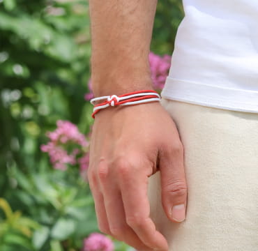 Bracelet Paquito pour homme en cordon multicolore rouge et fermoir argenté, fabrication artisanale française.