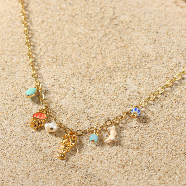 Collier Bandeloro doré à l’or fin et perles multicolores, bijou artisanal français inspiré des rivages lumineux.