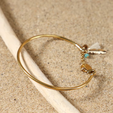 Bracelet jonc en métal doré et cordage beige, bijou artisanal fabriqué en France.