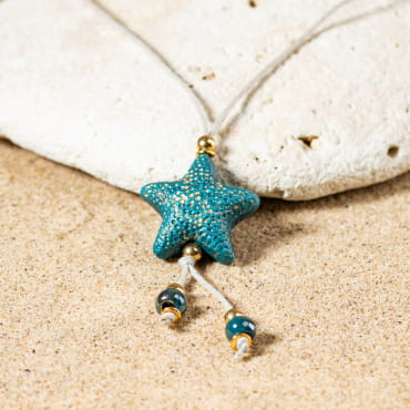 Sautoir pour femme Nausicaa doré et bleu pétrole en céramique