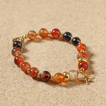 Bracelet Culcita doré à l’or fin et perles terracotta, création artisanale française estivale