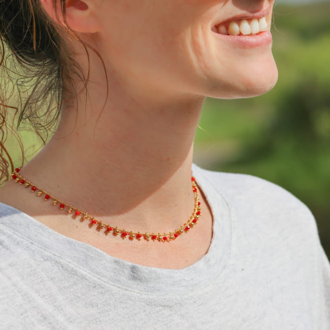 Collier ronde rouge et dorée fin. Origine france Garantie.