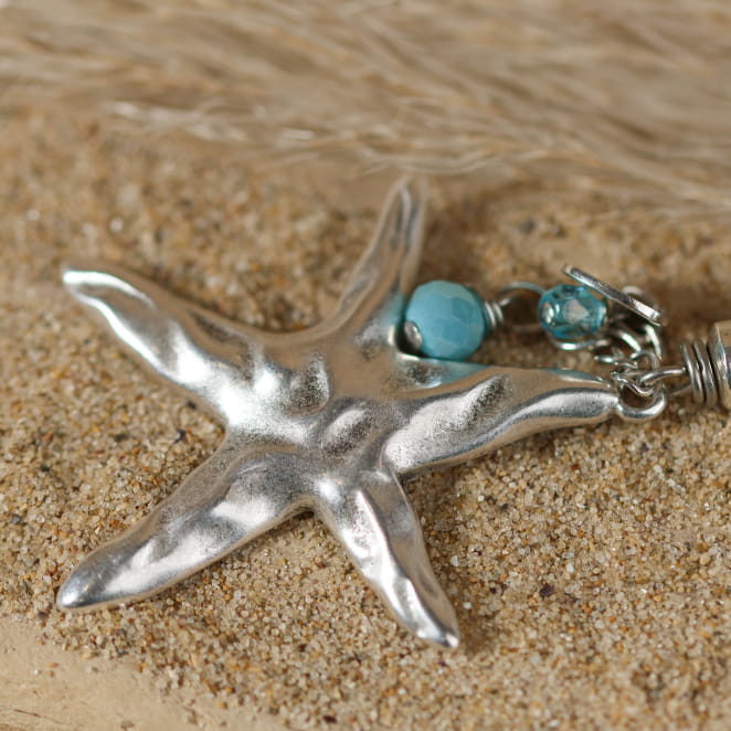 Bijou de sac Meria bleu montana avec étoile argentée, fait main en France