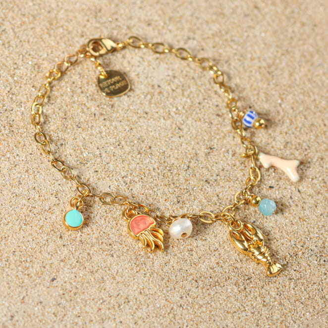 Bracelet Bandeloro doré et perles multicolores, fabrication artisanale française aux reflets marins.