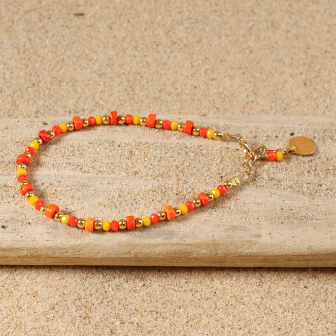 Bracelet Félicita en métal doré et perles orange multicolores, fabrication artisanale française.