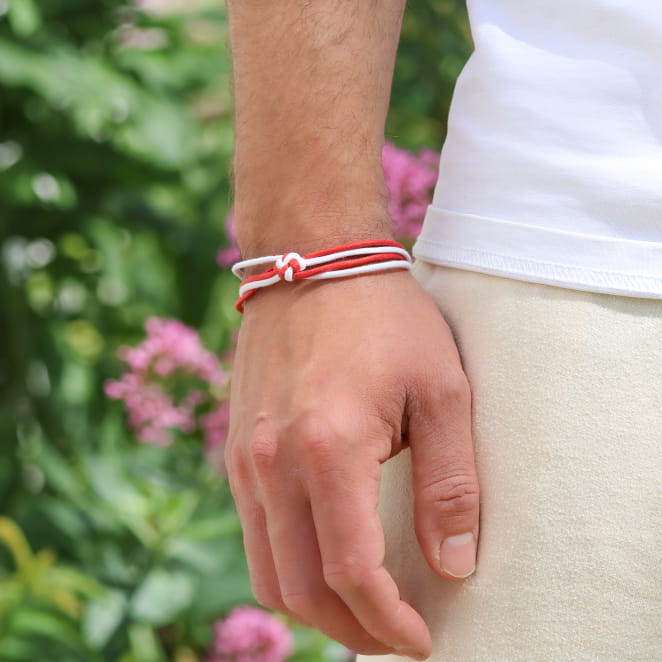 Bracelet Paquito pour homme en cordon multicolore rouge et fermoir argenté, fabrication artisanale française.