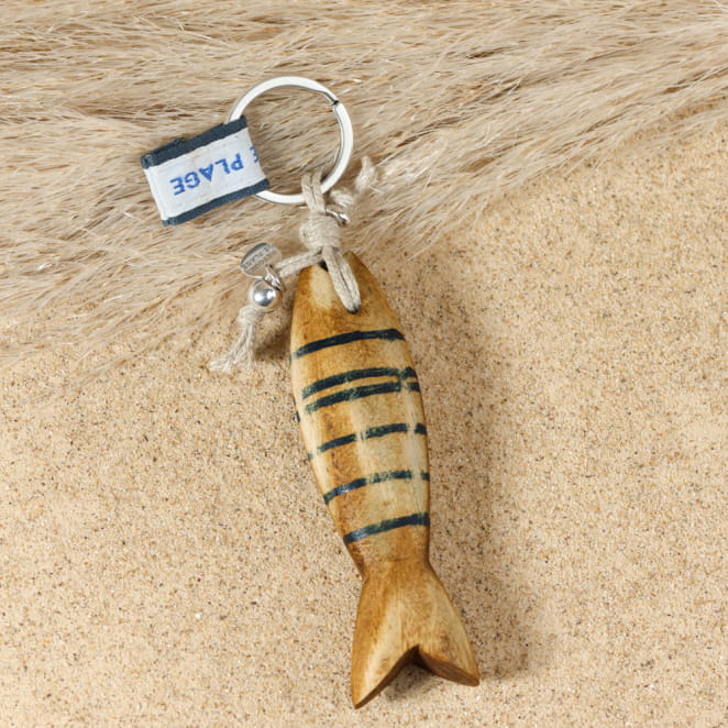 Porte-clés Colin en métal plaqué argent avec perles bleu marine, création artisanale française.