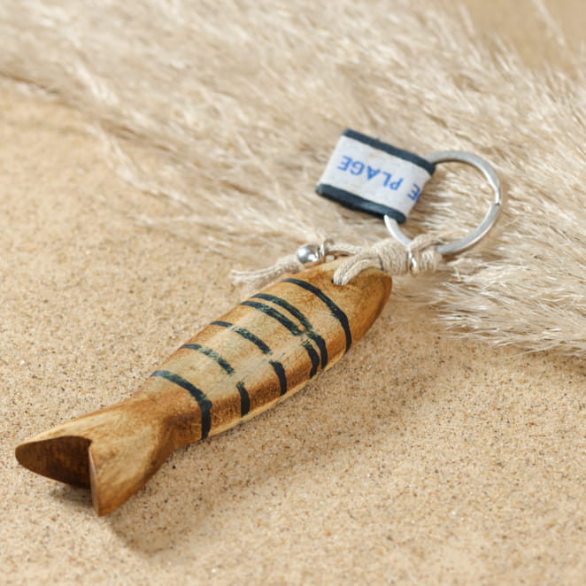 Porte-clés Colin argenté orné de perles bleu marine, fabrication artisanale française.