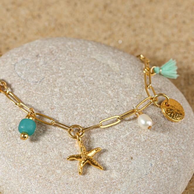 bracelet Dolcevita doré, perles vert d’eau et étoile dorée centrale, création artisanale française