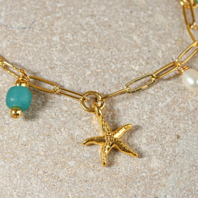 bracelet Dolcevita doré, perles vert d’eau et étoile de mer dorée, bijou fait main sur l’Île d’Oléron