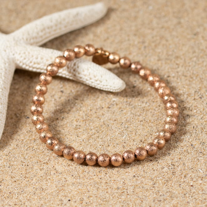 Bracelet fantaisie femme doré rose