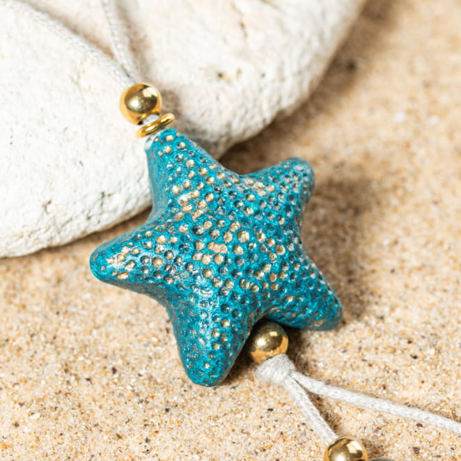 Sautoir pour femme Nausicaa doré et bleu pétrole en céramique