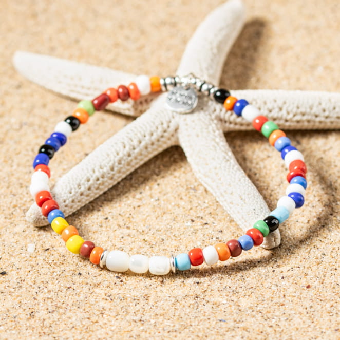 Bracelet homme Dragan multicolore, tissage artisanal vibrant et fermoir métallique, pour les esprits libres.