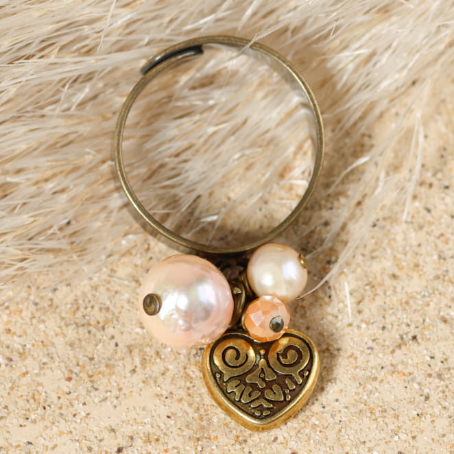 Bague Brunelle bronze et perle saumon, monture texturée – création artisanale raffinée