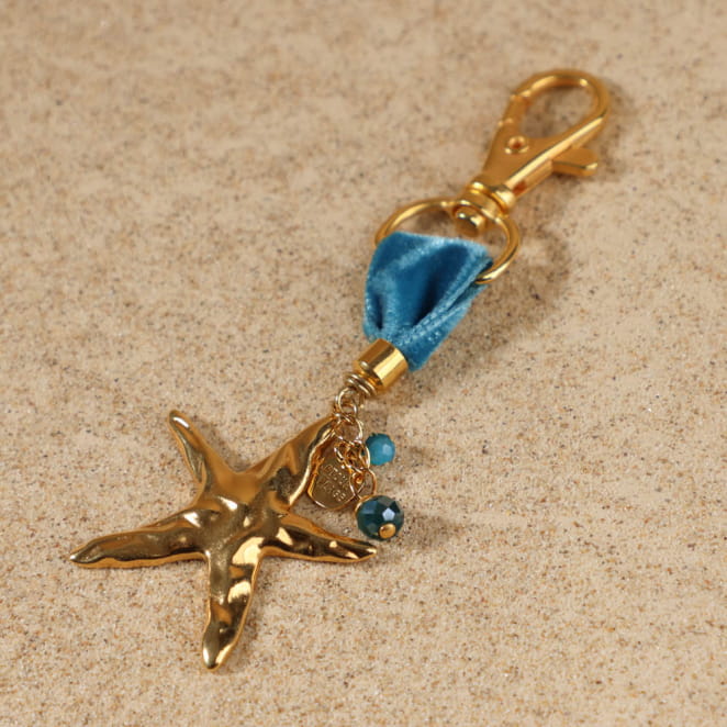 Porte-bonheur Meria bleu et doré, bijou de sac fabriqué artisanalement en France