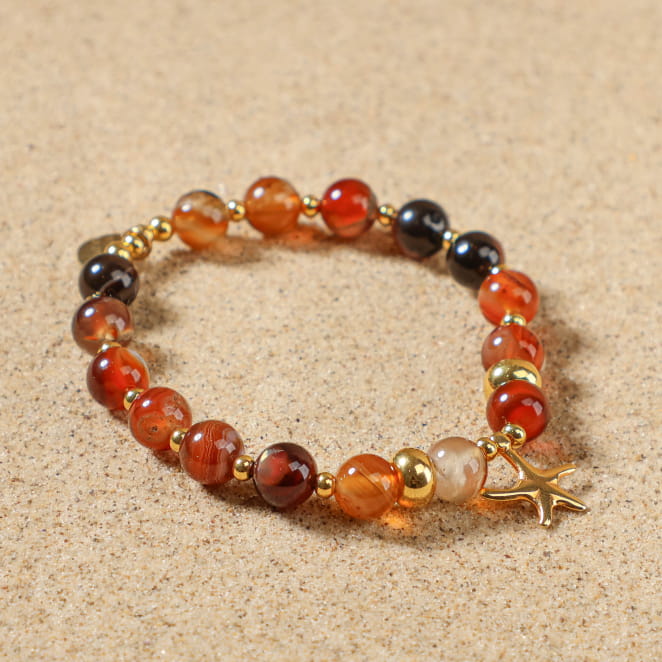 Bracelet Culcita doré à l’or fin et perles terracotta, création artisanale française estivale