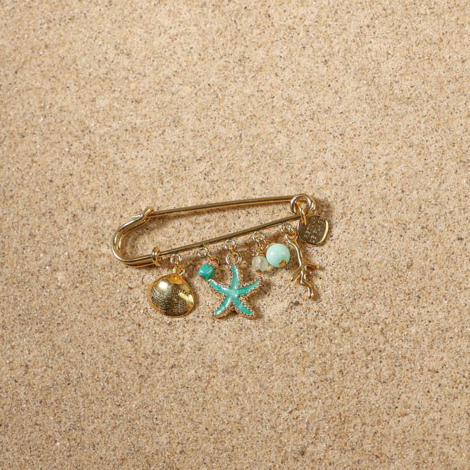 Bijou Méditerranée doré et perle vert d’eau, fabrication française raffinée.