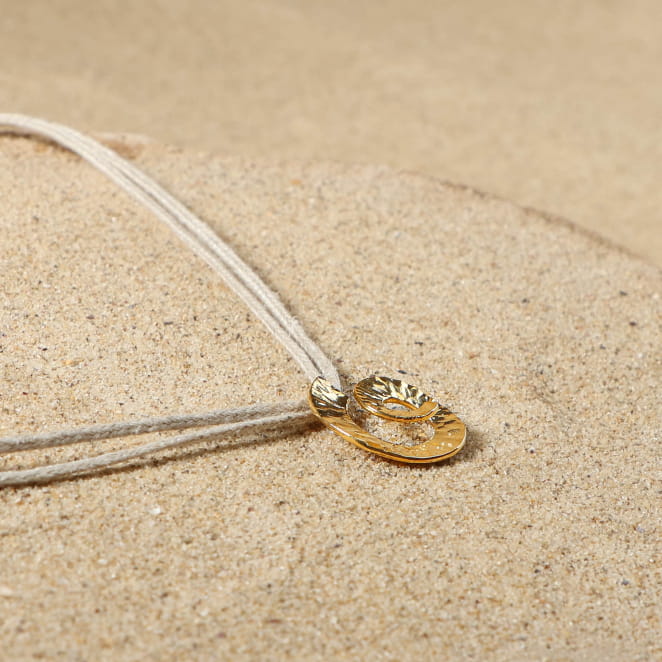 Bijou porte-clés Merlu argenté et perle verte, création française au style marin.