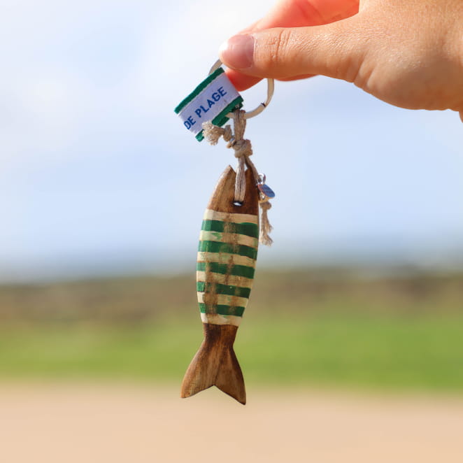 Porte-clés Colin artisanal en métal argenté et corde verte, fabrication française.
