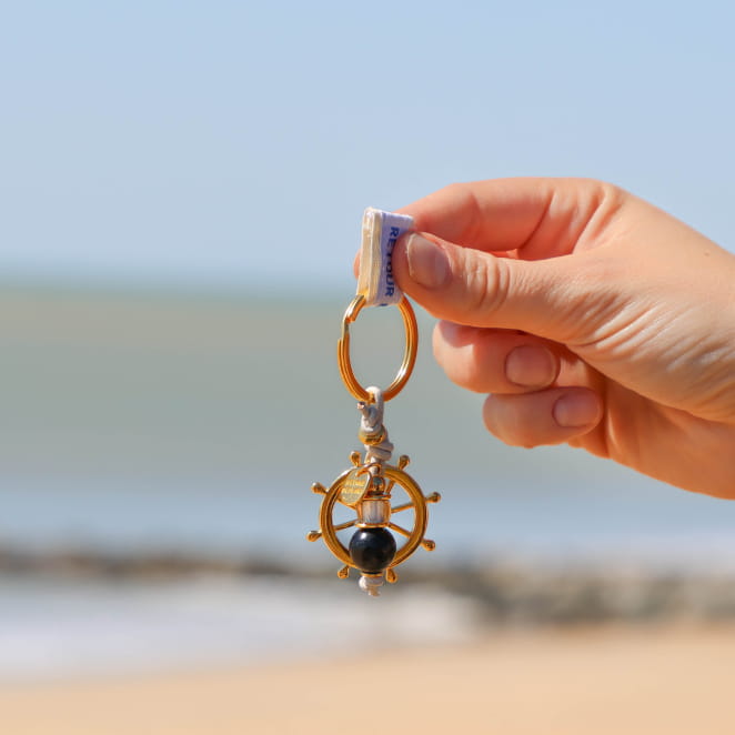 porte-clés Roue doré noir, création artisanale française