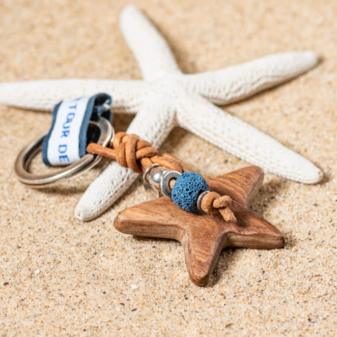 Porte-clefs étoile en bois et perle en verre bleu montana